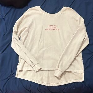 Cream Sweatshirt with Red Text